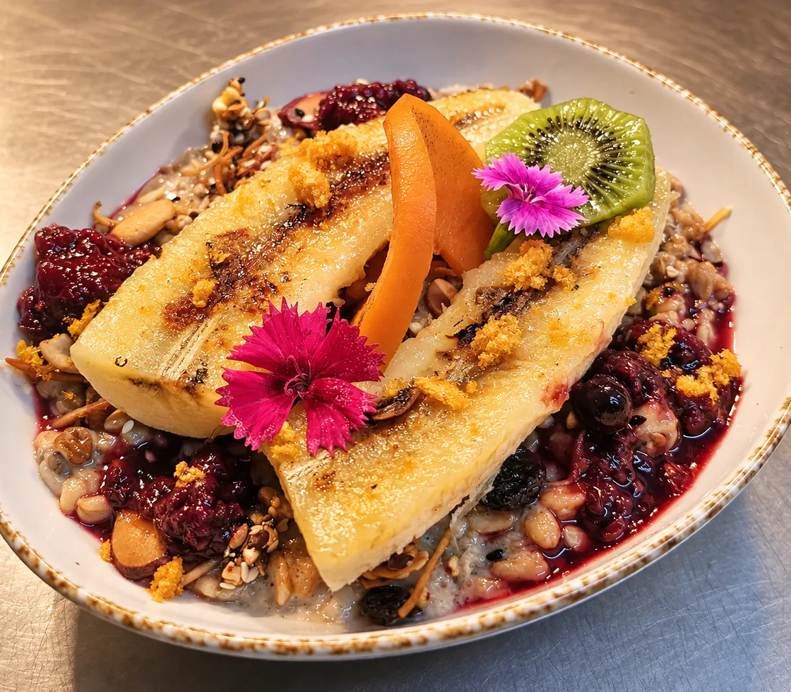 Brioche French Toast with grilled banana, fruit and berry compote