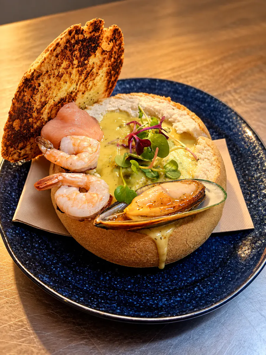 A savoury plate with prawns, mussel and toasted bread at The Sugar Bowl Cafe